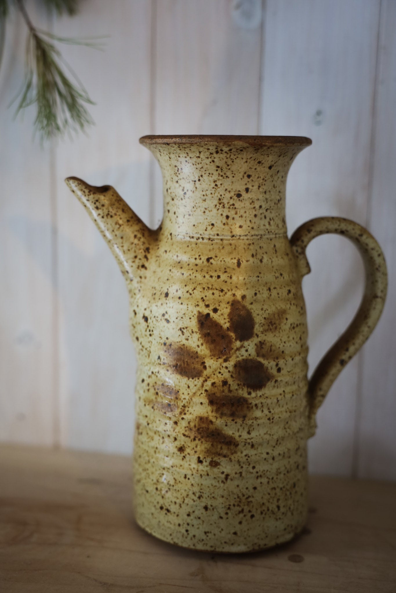 Beige Pottery Pitcher