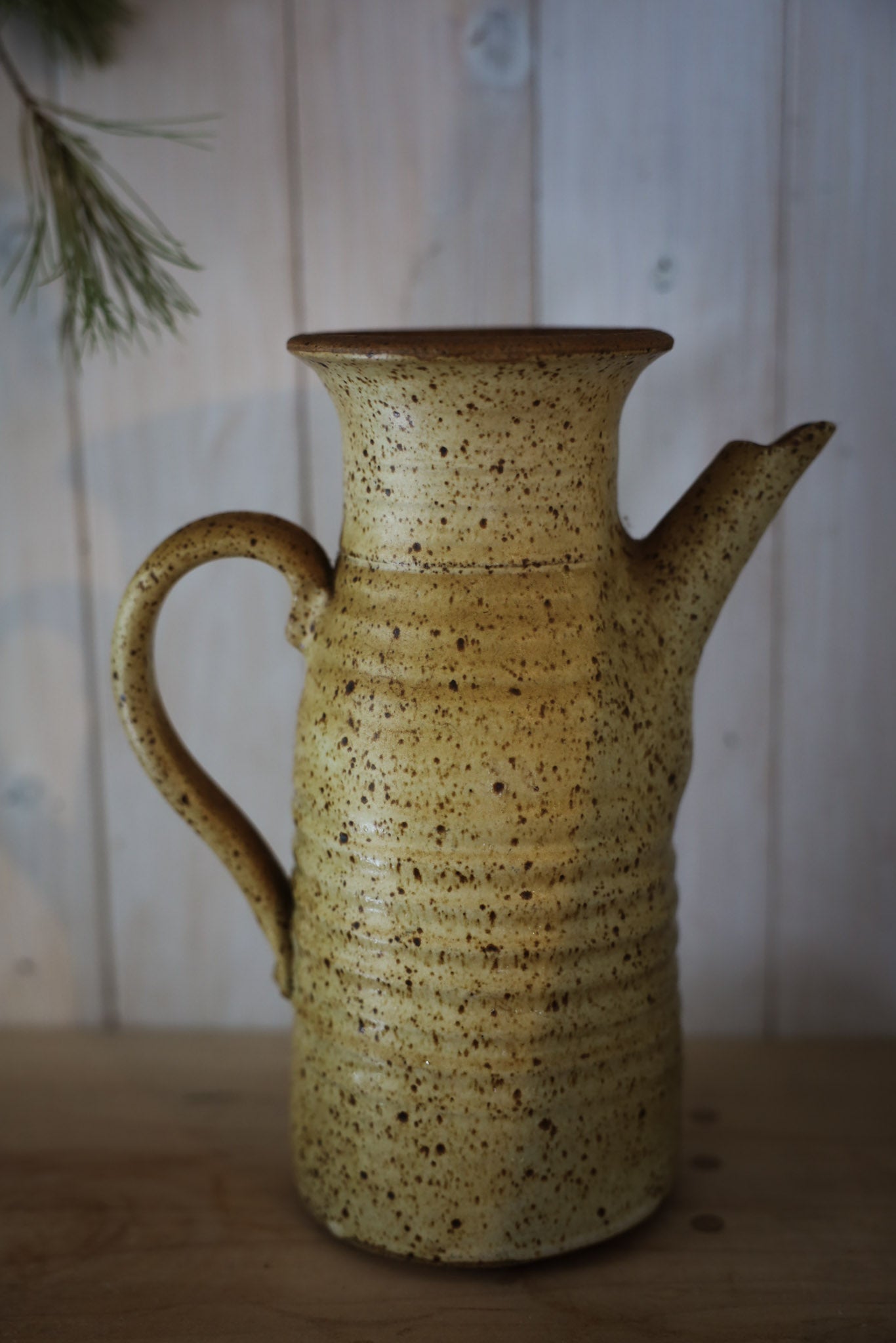 Beige Pottery Pitcher