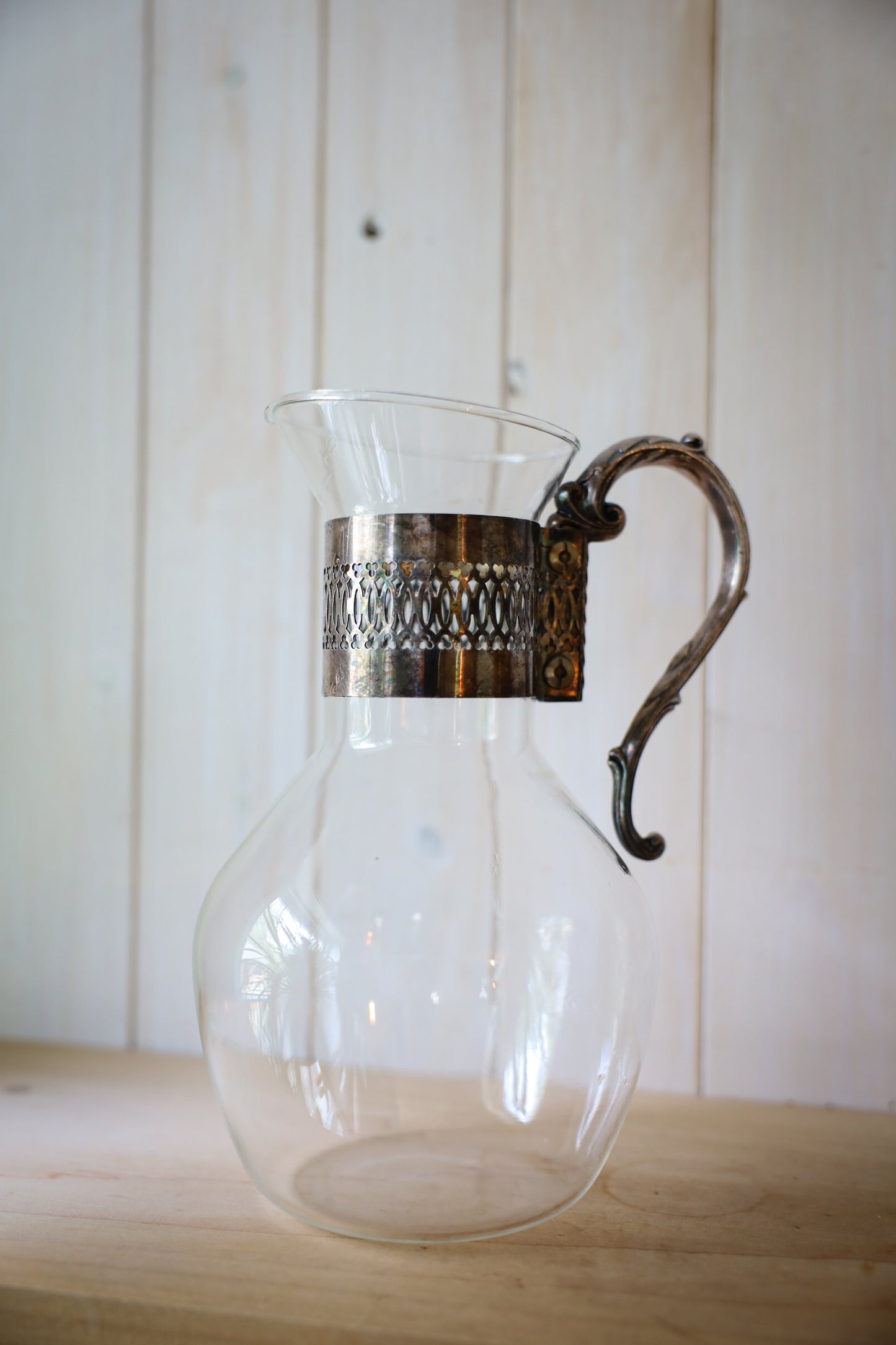 Vintage Glass Pitcher with Ornate Silver-Tone Handle