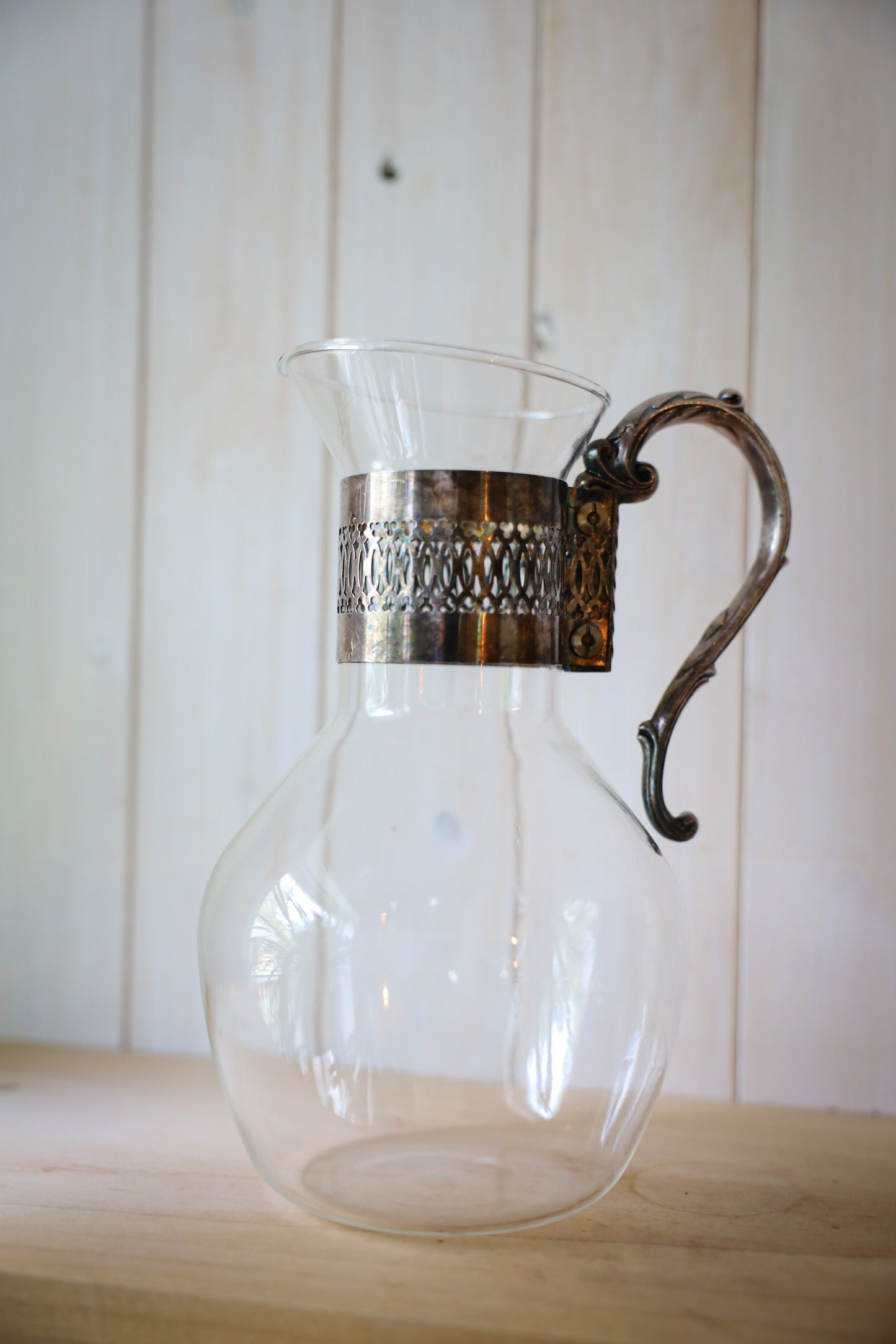 Vintage Glass Pitcher with Ornate Silver-Tone Handle