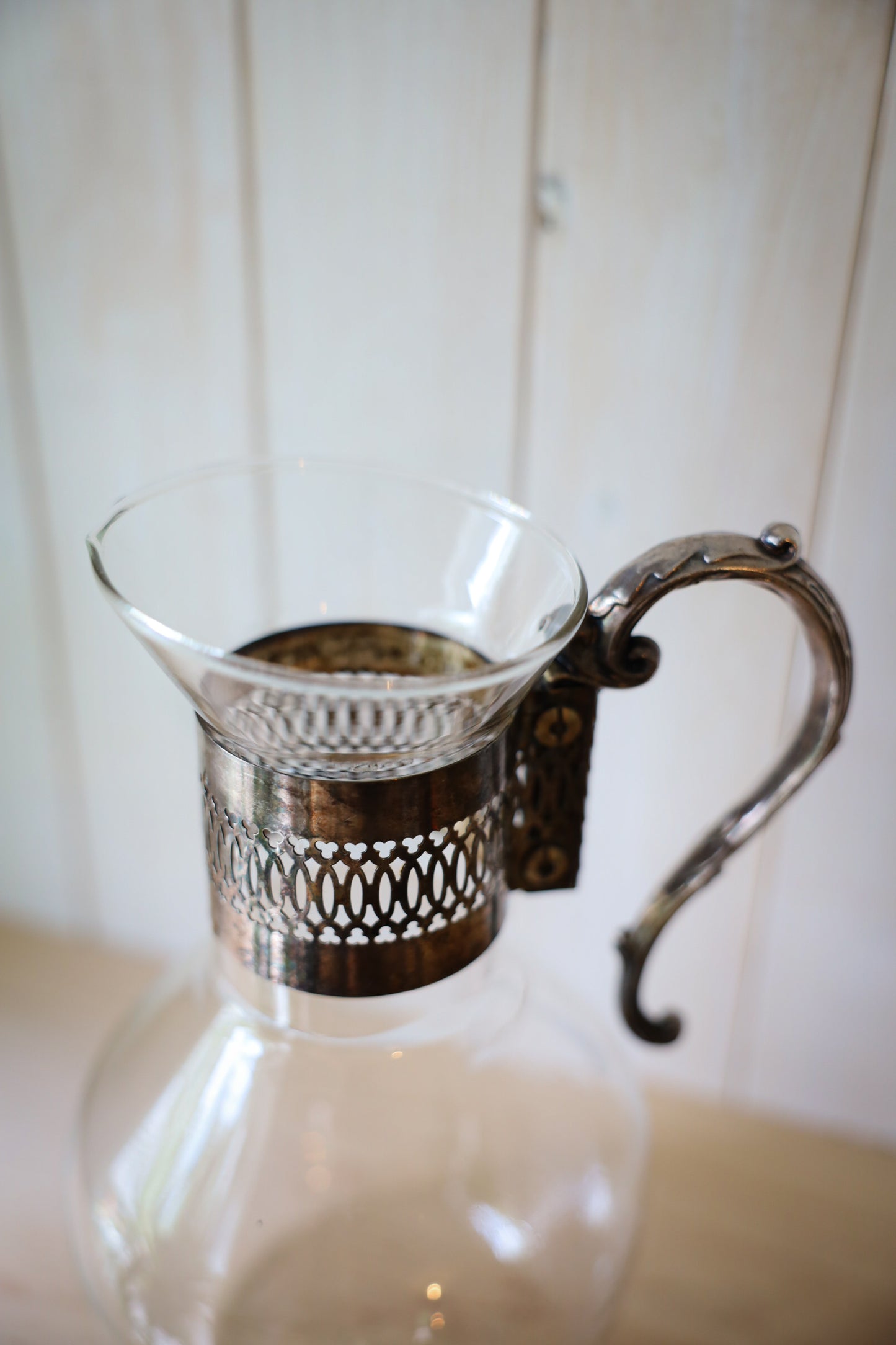 Vintage Glass Pitcher with Ornate Silver-Tone Handle